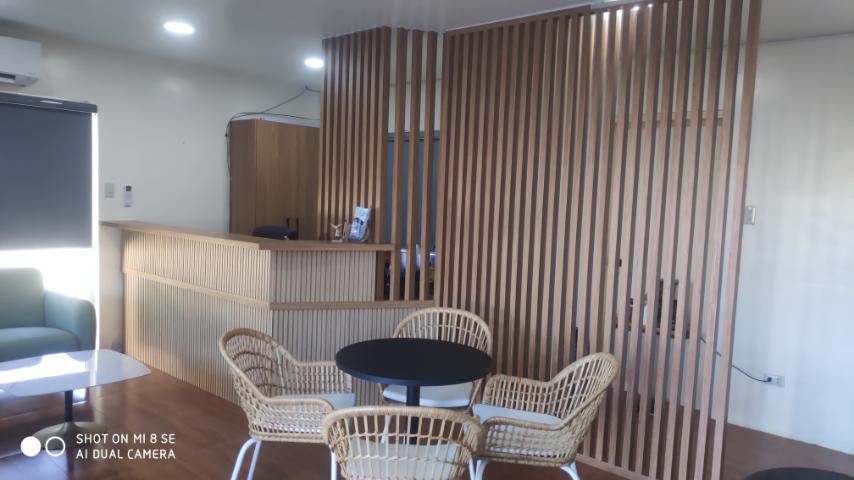 Blue kitchen with white backsplash
